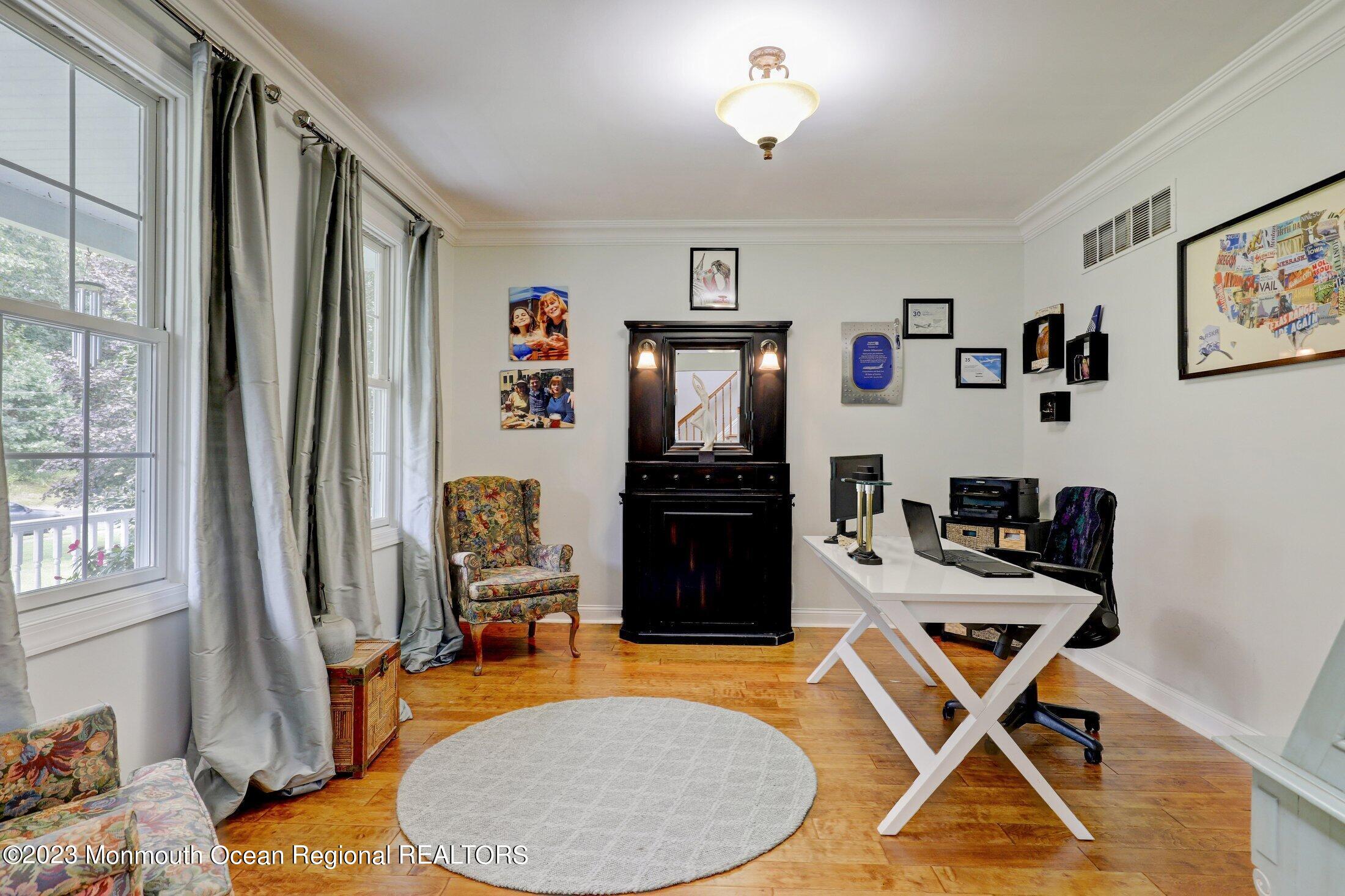 352 Lanes Pond Road Howell, NJ 07731 - Photo 22 of 67 a room with furniture and a window