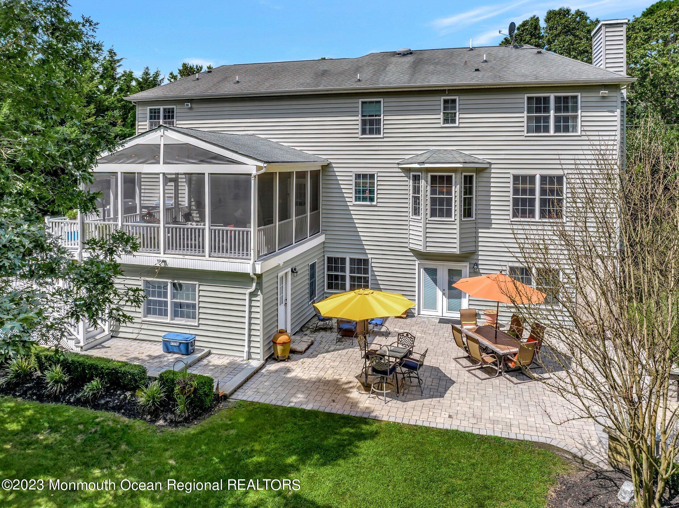 352 Lanes Pond Road Howell, NJ 07731 - Photo 44 of 67 a view of a house with backyard and sitting area