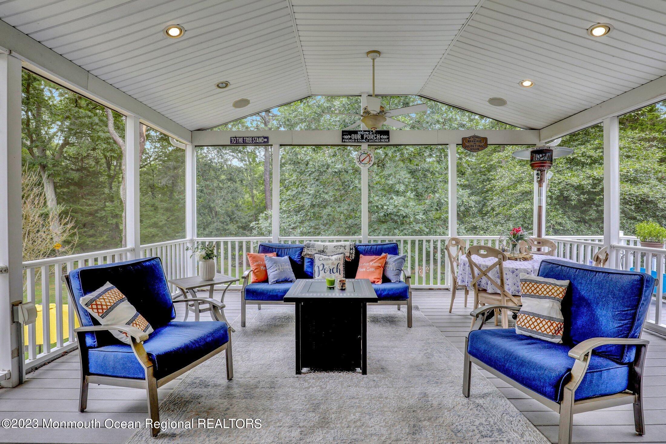 352 Lanes Pond Road Howell, NJ 07731 - Photo 46 of 67 a living room with furniture and a large window