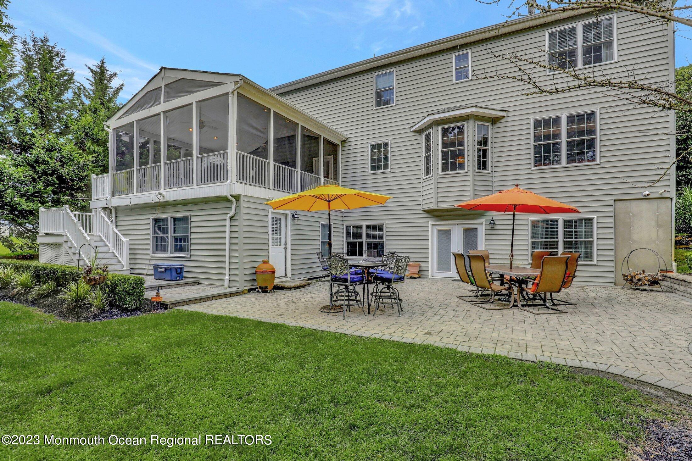 352 Lanes Pond Road Howell, NJ 07731 - Photo 53 of 67 a view of a house with a yard and sitting area
