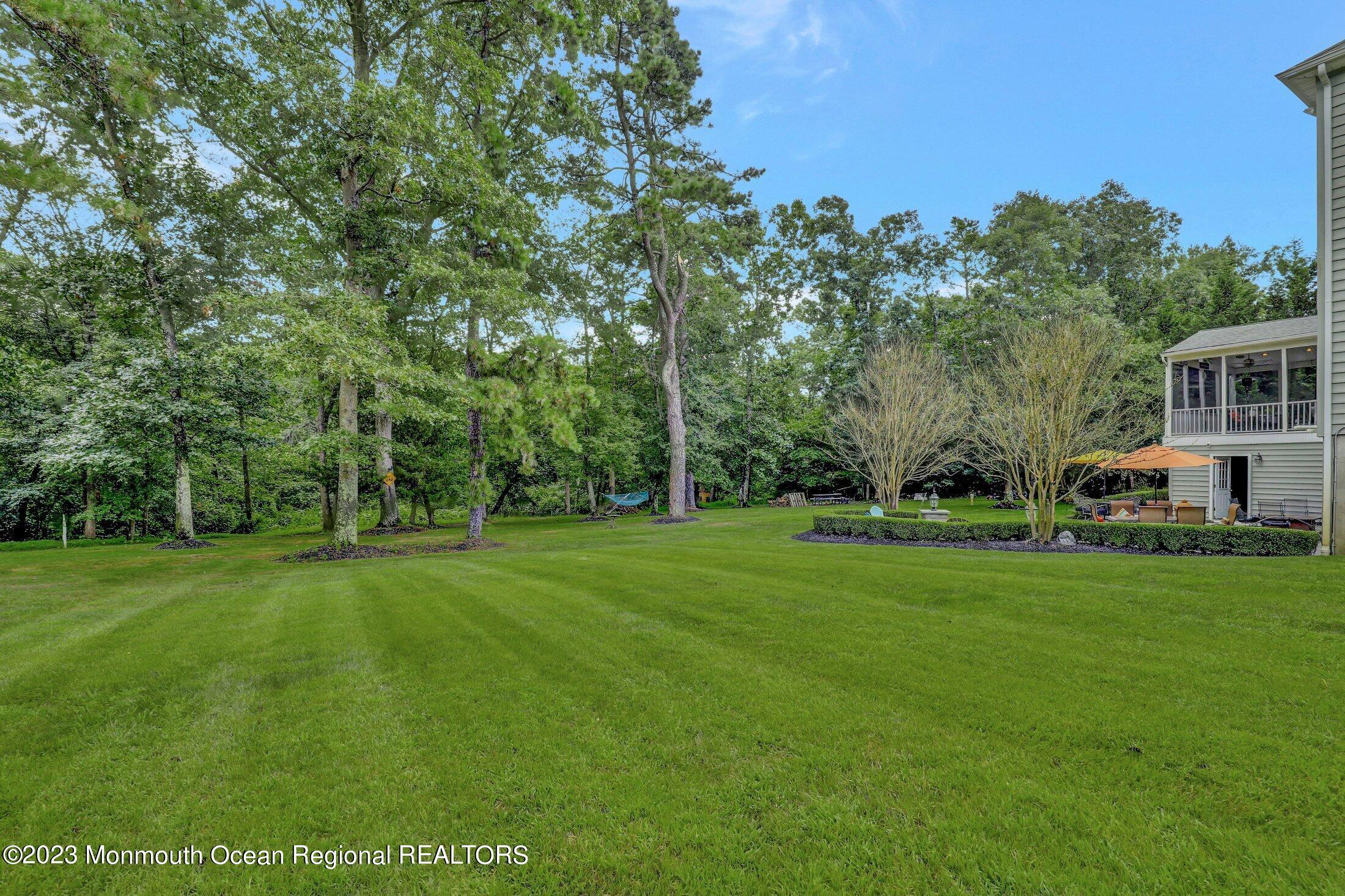 352 Lanes Pond Road Howell, NJ 07731 - Photo 55 of 67 a view of a house with a big yard