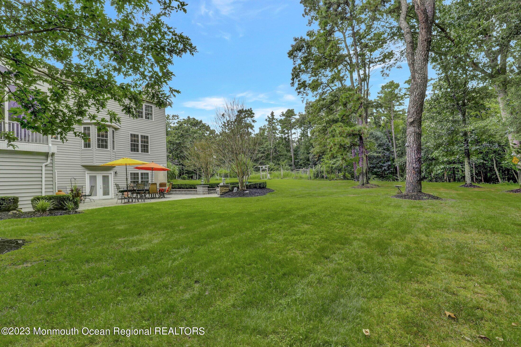 352 Lanes Pond Road Howell, NJ 07731 - Photo 56 of 67 a view of a house with a big yard
