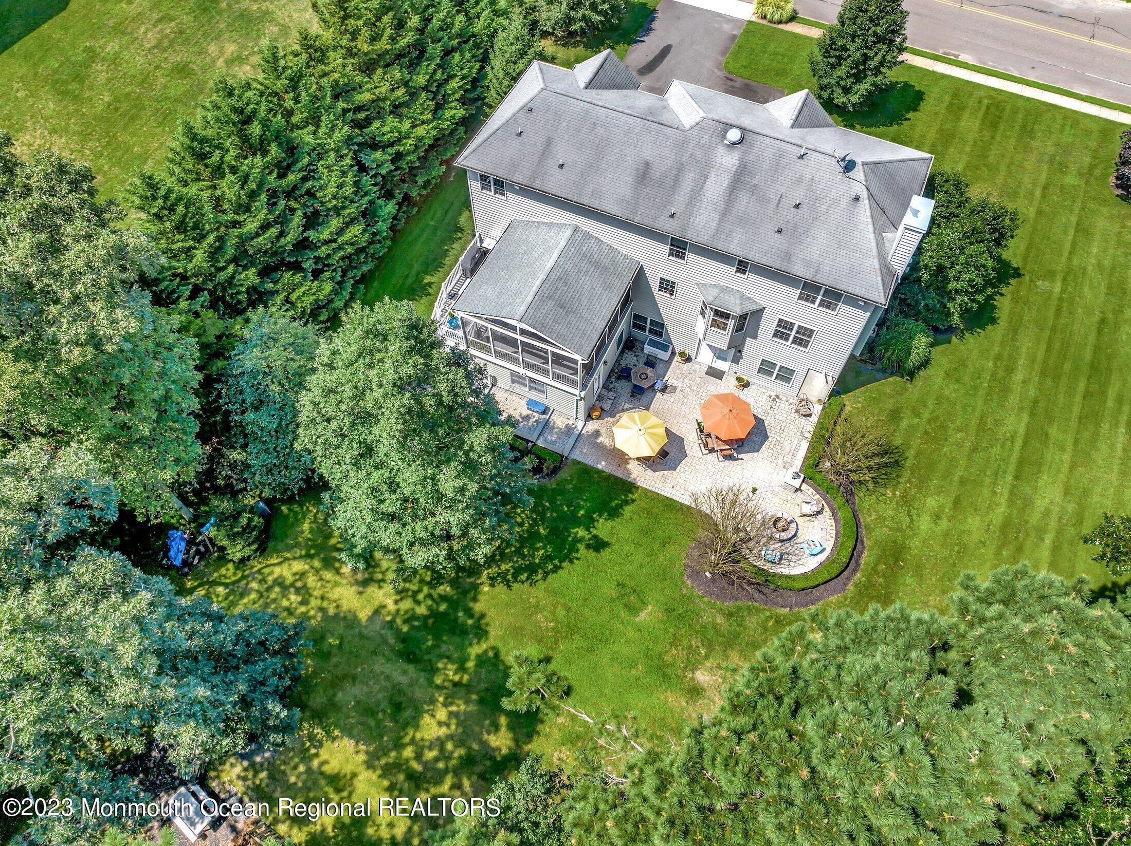 352 Lanes Pond Road Howell, NJ 07731 - Photo 58 of 67 an aerial view of a house with garden space sitting space and barbeque oven