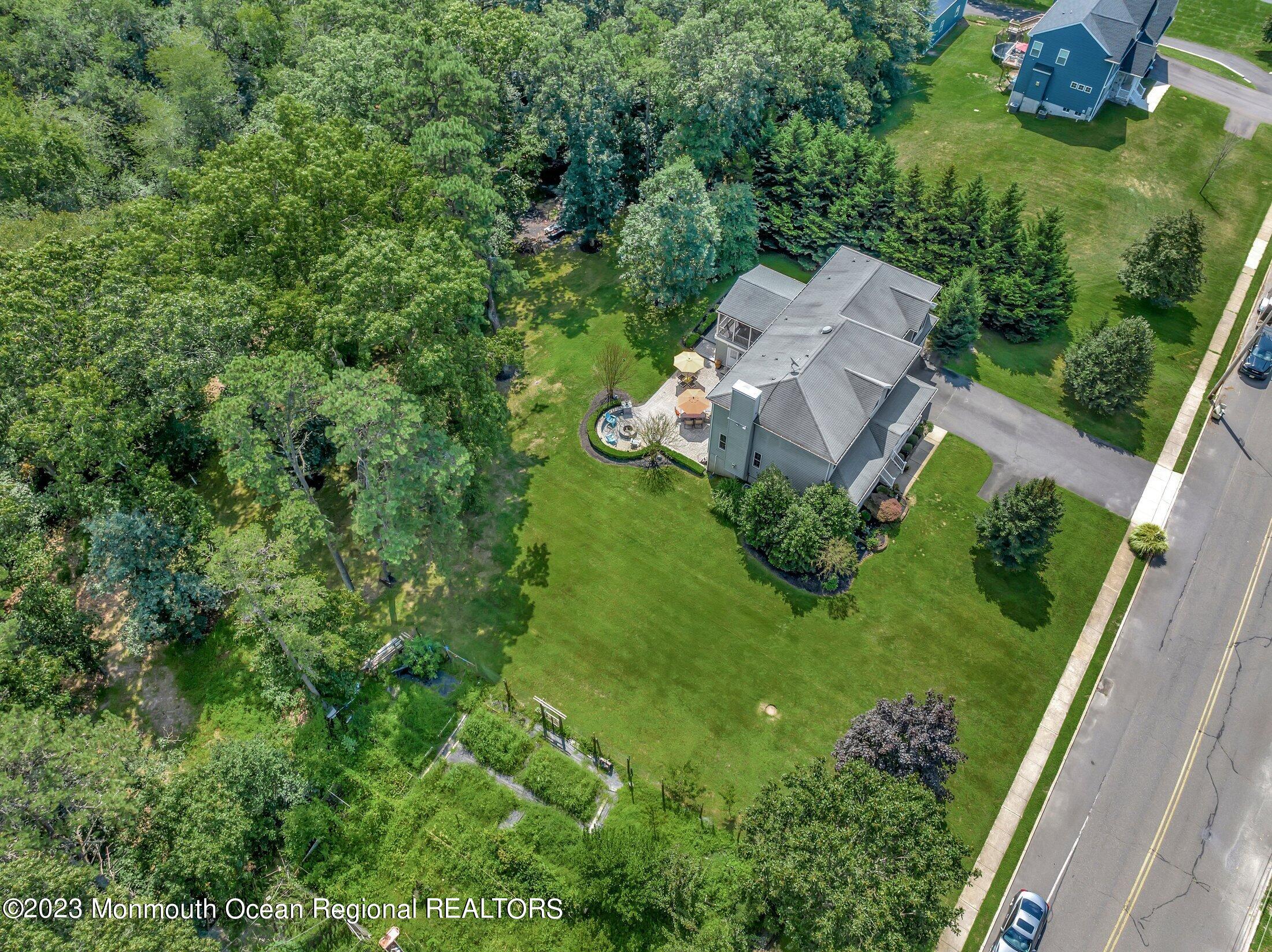 352 Lanes Pond Road Howell, NJ 07731 - Photo 61 of 67 an aerial view of a house with garden