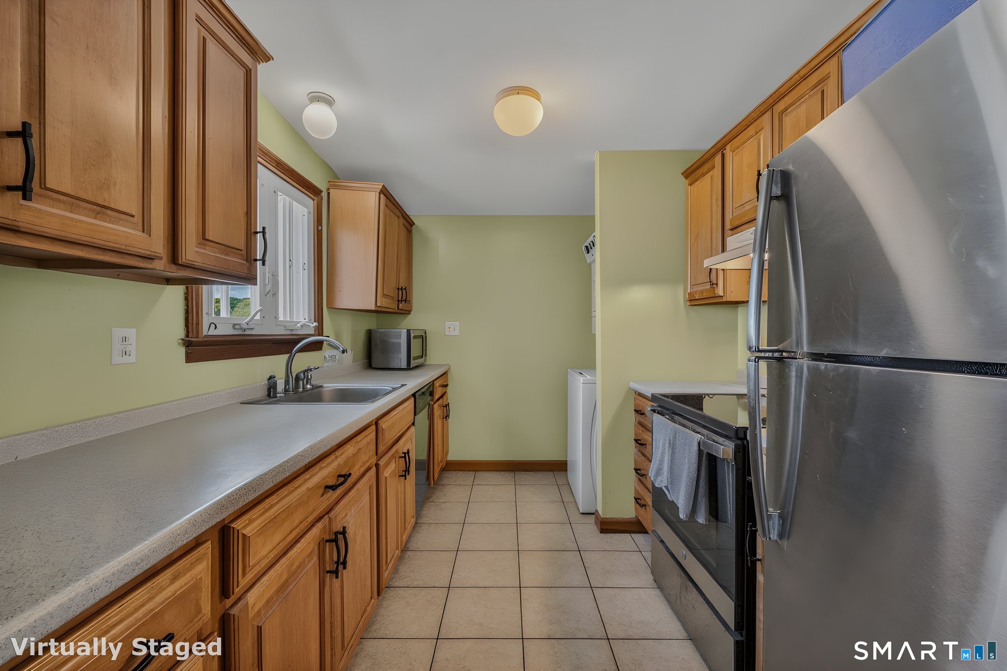 210 Shore Road Waterford, CT 06385 - Photo 20 of 26 a kitchen with granite countertop a sink stove and refrigerator