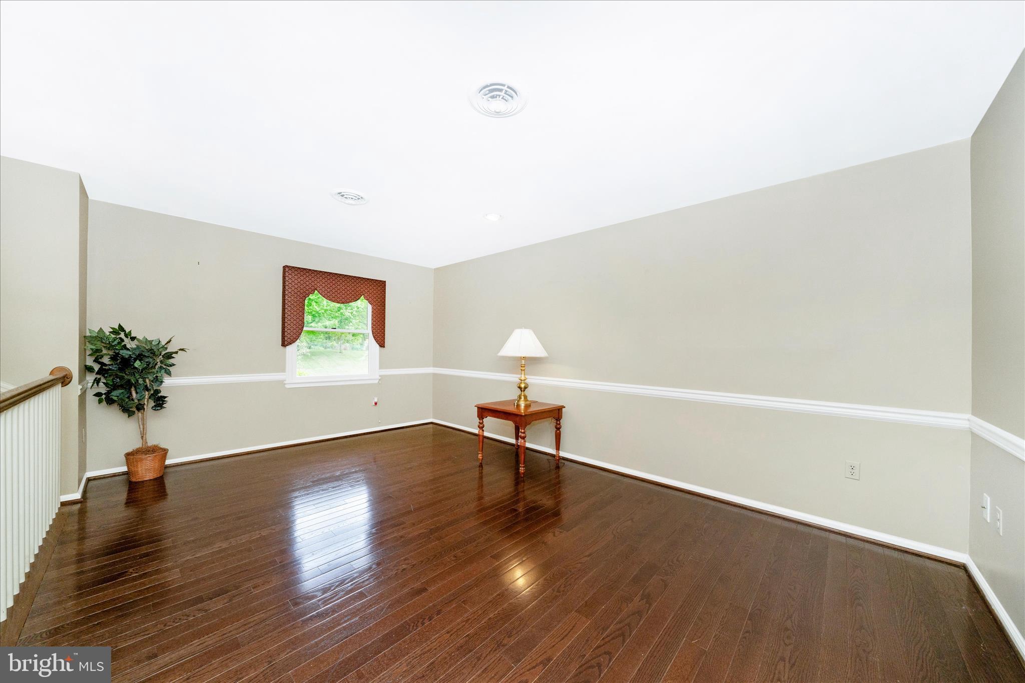 3204 Hooper Road New Windsor, MD 21776 - Photo 11 of 63 Living Room has Gleaming HW Floor s