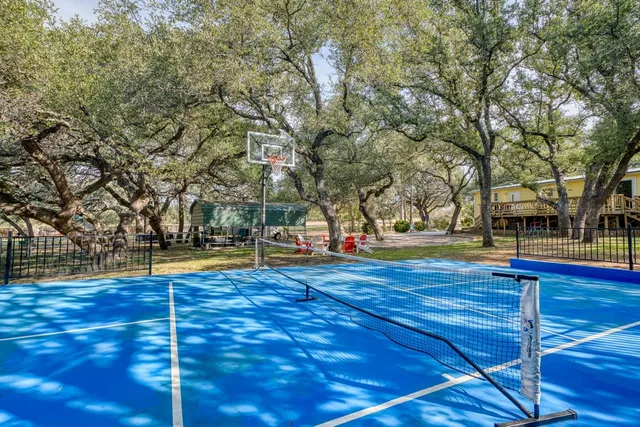 a view of outdoor space yard and basketball court
