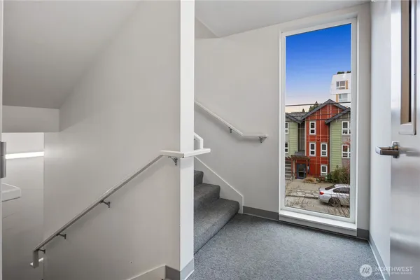 a view of a buildings in front of yard