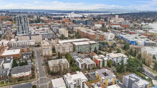 a view of city view with large buildings and ocean view