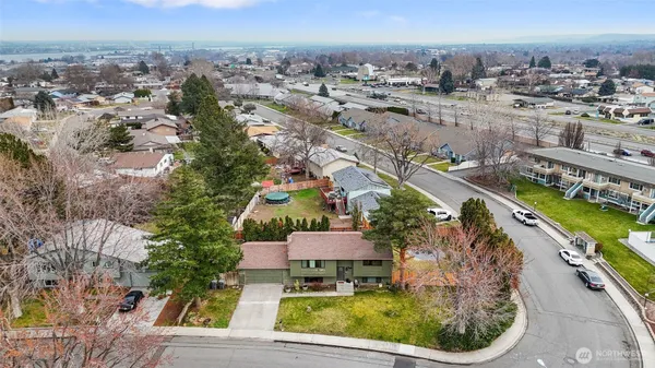 an aerial view of a house with a garden