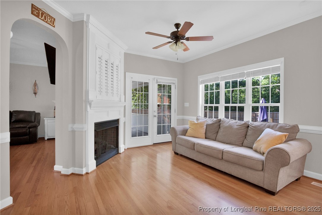 1199 Hunters Trail Hope Mills, NC 28348 - Photo 12 of 45 a living room with furniture and a fireplace
