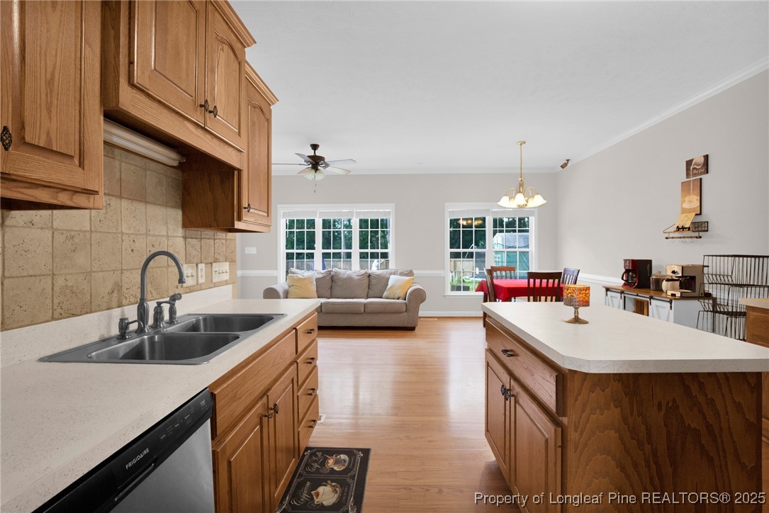 1199 Hunters Trail Hope Mills, NC 28348 - Photo 15 of 45 a kitchen with a sink and cabinets