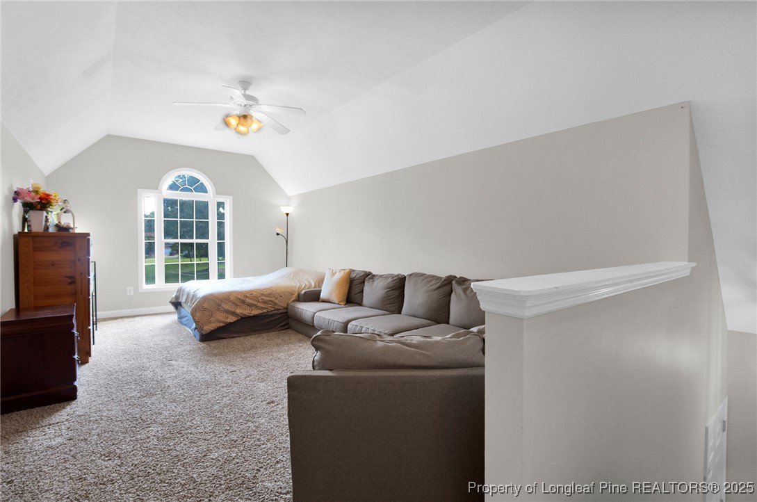 1199 Hunters Trail Hope Mills, NC 28348 - Photo 26 of 45 a living room with furniture and a large window