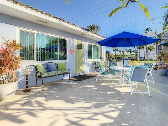 an aerial view of residential building and lake