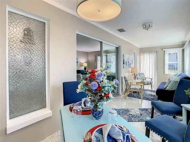 a view of a dining room with furniture