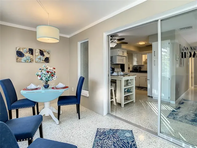 a kitchen with stainless steel appliances granite countertop a stove and cabinets