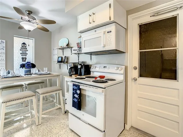 a bathroom with a sink vanity and a mirror