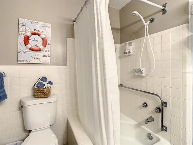 an aerial view of a house with a swimming pool