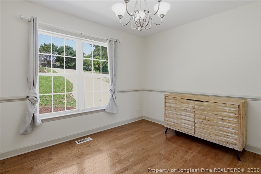 1075 Buffalo Lake Road Sanford, NC 27332 - Photo 7 of 49 a view of an empty room with a window