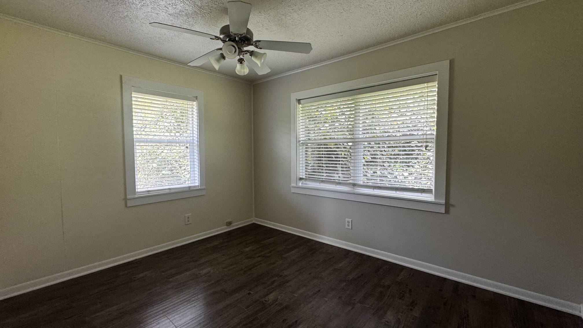 30827 Burton Cemetery Road Waller, TX 77484 - Photo 8 of 19 a view of an empty room with wooden floor and a window