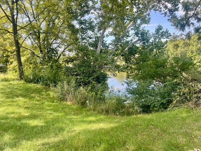 3369 East 2059th Road Wedron, IL 60557 - Photo 8 of 22 a backyard of a house with lots of green space