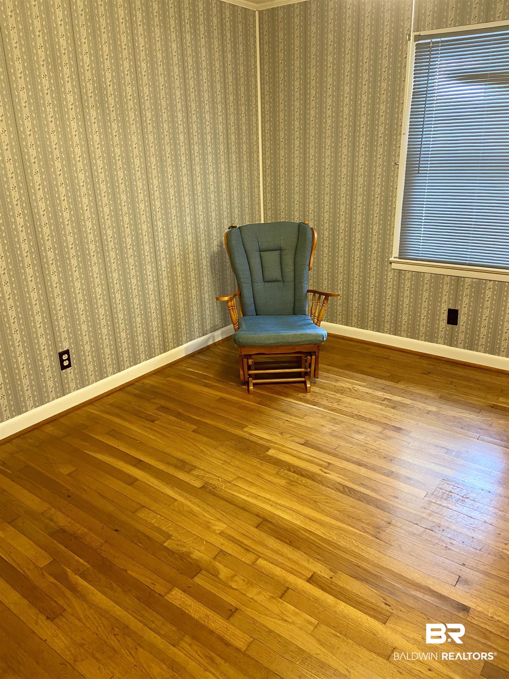 102 Ashley Street Evergreen, AL 36401 - Photo 8 of 26 Living area with hardwood / wood-style floors