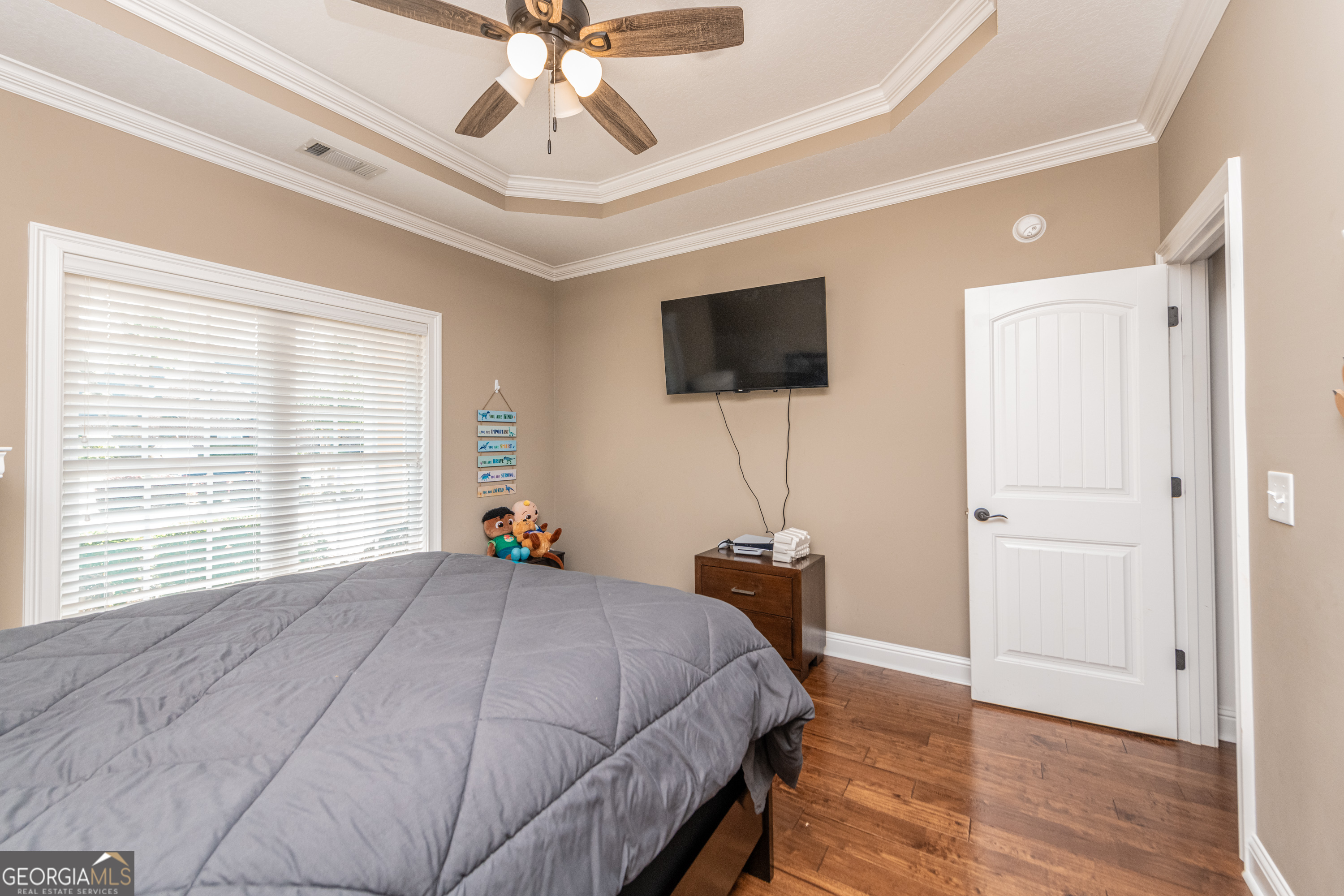 405 Old Bridge Road Warner Robins, GA 31088 - Photo 29 of 55 a bedroom with a bed and a flat screen tv