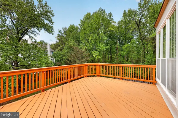 a view of a wooden floor and a trees