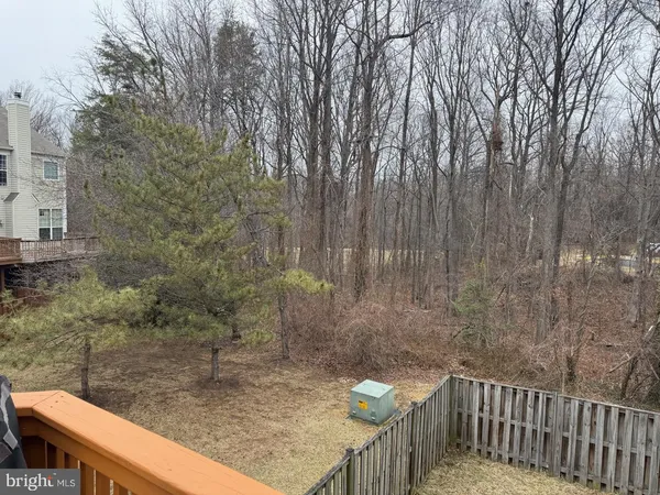 a view of a wooden floor and a trees