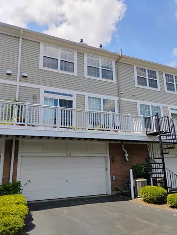 a front view of a building with balcony