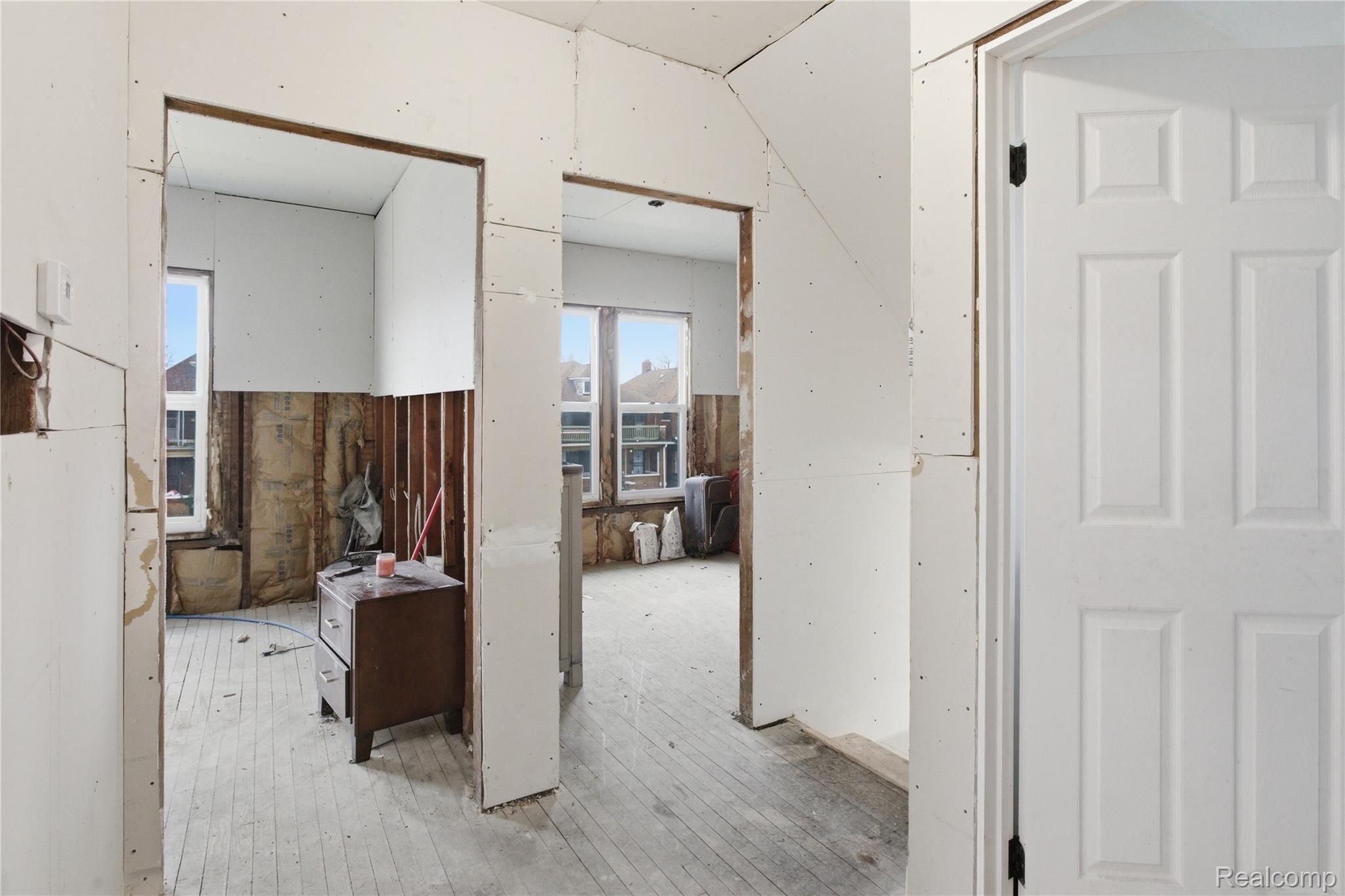 4624 Pacific Street Detroit, MI 48204 - Photo 25 of 39 Hallway featuring wood-type flooring