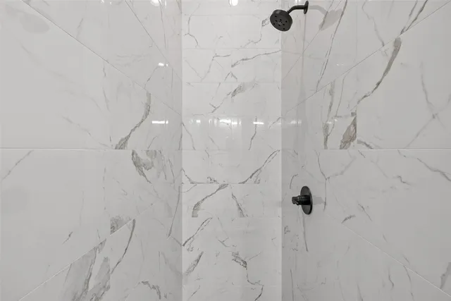 a bathroom with sinks and a mirror