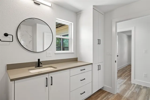 a view of a hallway with washer and dryer