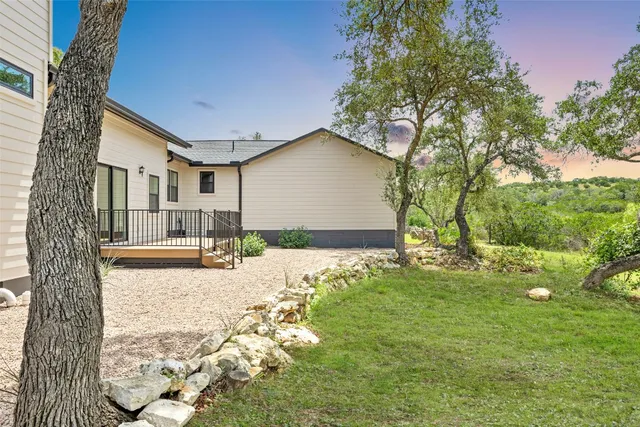 a view of a kitchen with microwave and cabinets
