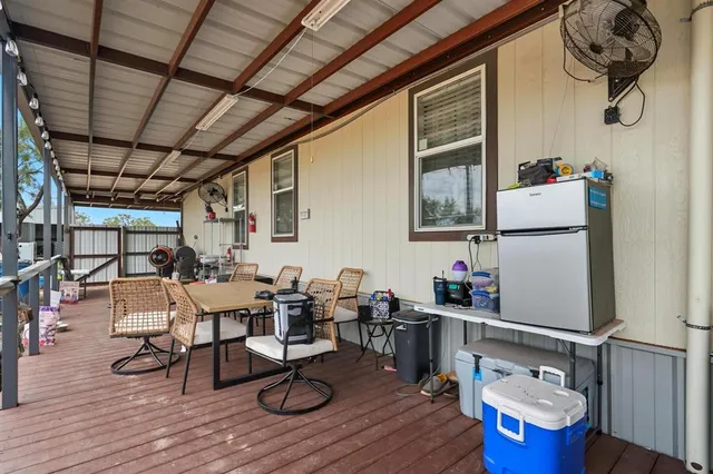 a room with furniture and wooden floor