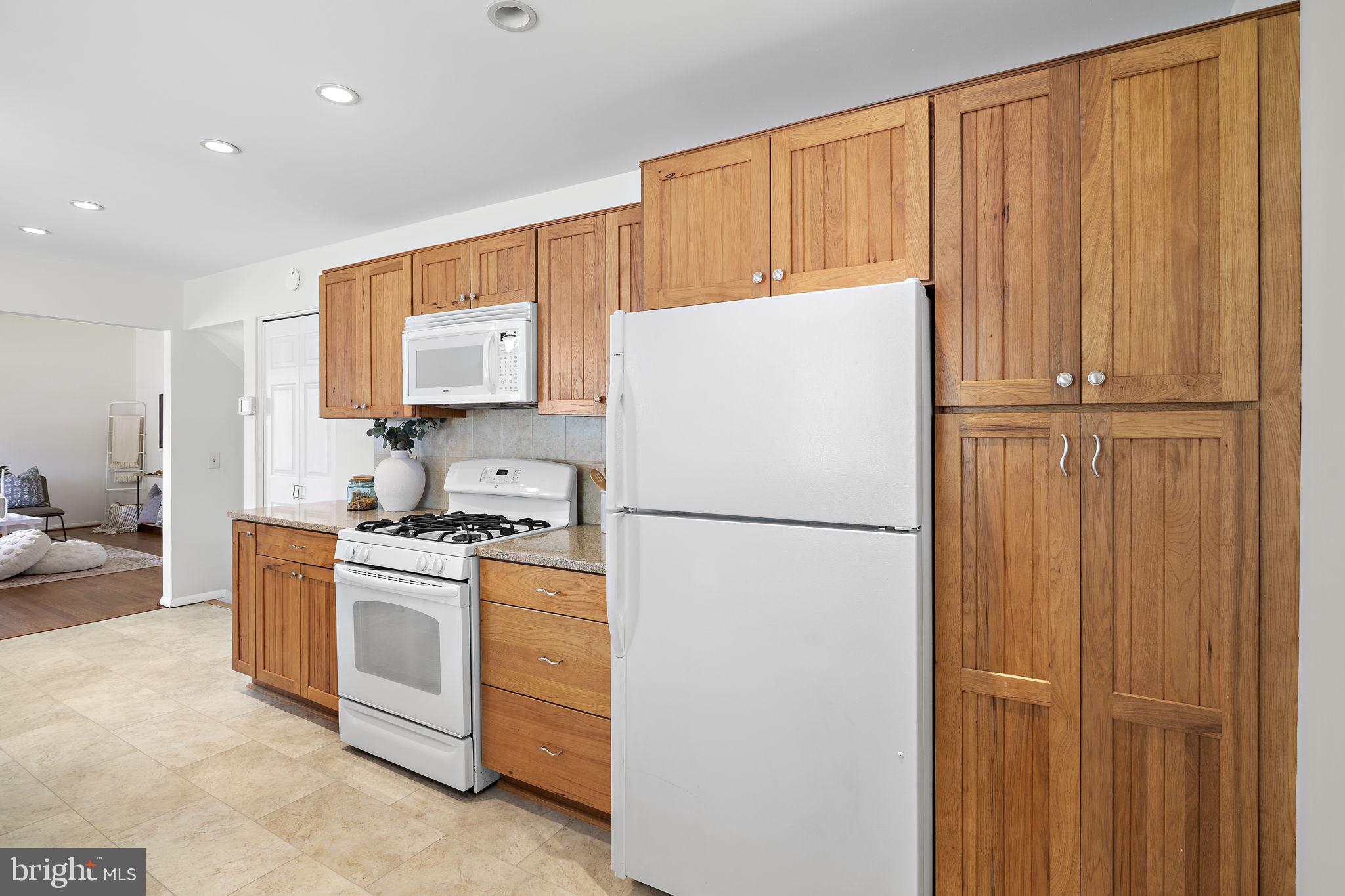 9004 Tammy Road Baltimore, MD 21236 - Photo 9 of 27 Charming kitchen with warm wood accents.
