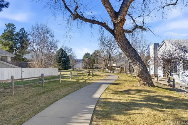 a view of yard with swimming pool