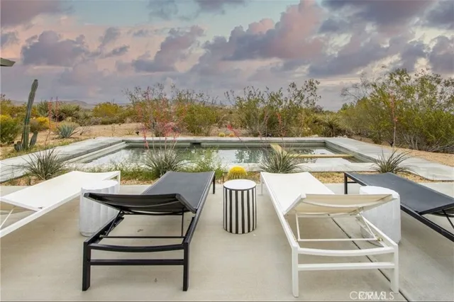 a view of a terrace with furniture
