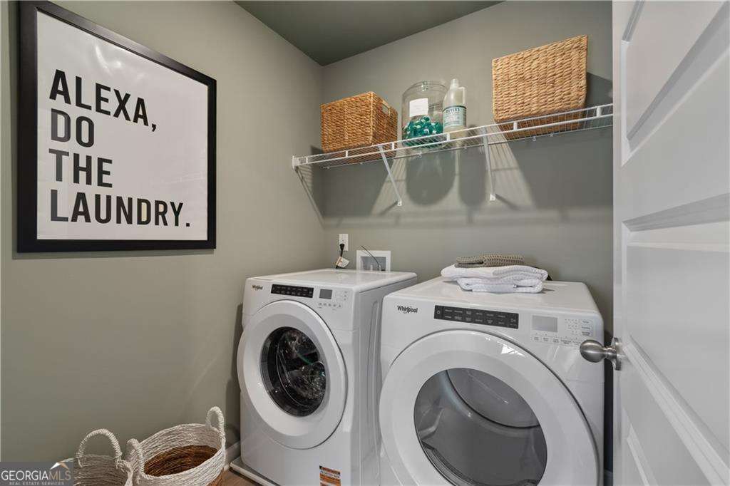 412 Hartsfield Road McDonough, GA 30253 - Photo 29 of 43 a utility room with dryer and washer