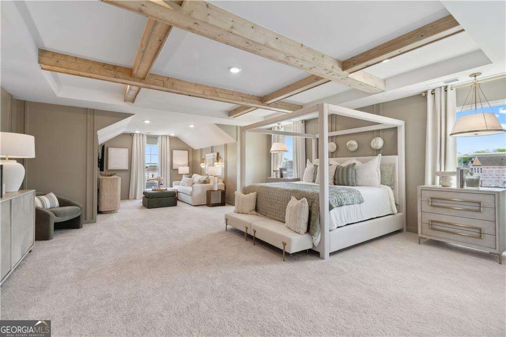 412 Hartsfield Road McDonough, GA 30253 - Photo 34 of 43 a large white bed sitting in a room next to a lamp