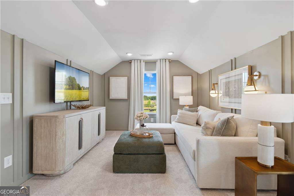 412 Hartsfield Road McDonough, GA 30253 - Photo 35 of 43 a living room with furniture and a flat screen tv