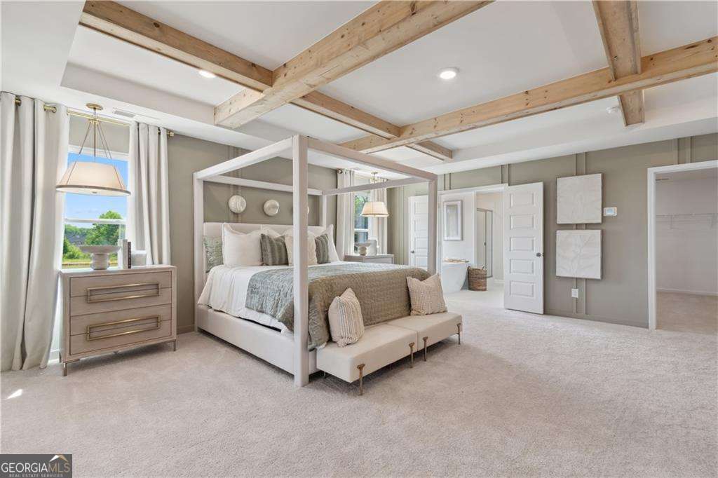 412 Hartsfield Road McDonough, GA 30253 - Photo 36 of 43 a bed sitting in a spacious bedroom next to a window