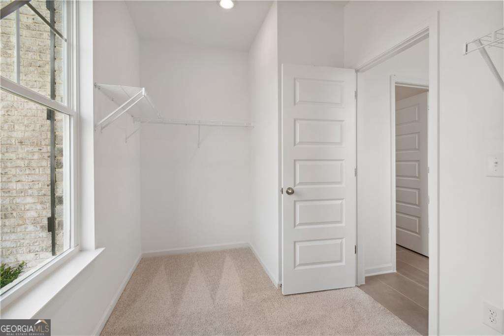 412 Hartsfield Road McDonough, GA 30253 - Photo 10 of 43 a view of an empty walk in closet