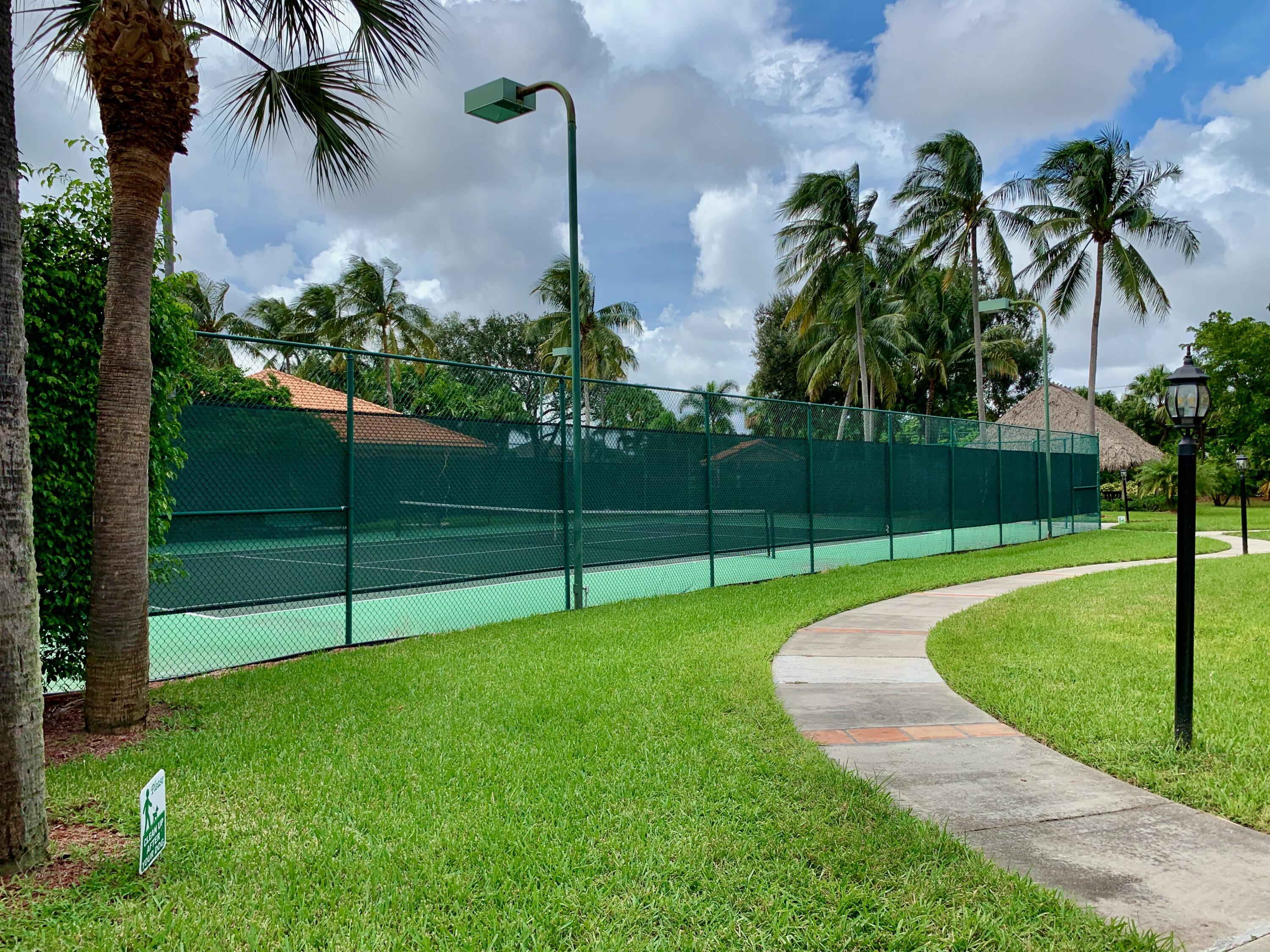 3113 Clint Moore Road, Unit 107 Boca Raton, FL 33496 - Photo 19 of 26 Tennis Court