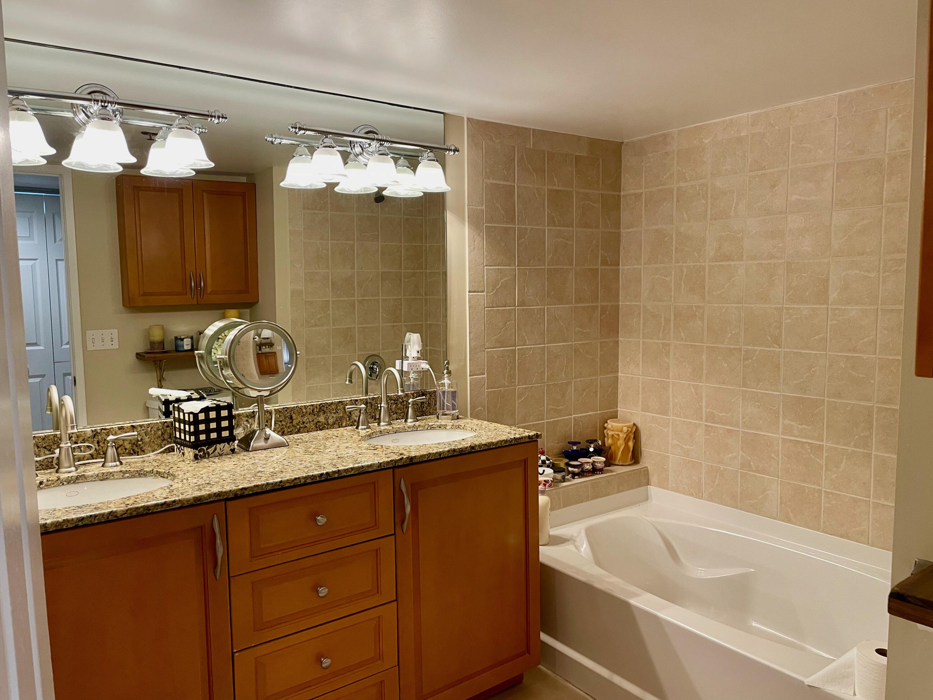 3113 Clint Moore Road, Unit 107 Boca Raton, FL 33496 - Photo 8 of 26 Primary Bath