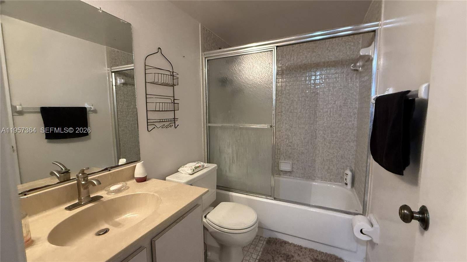 6800 Cypress Road, Unit 501 Plantation, FL 33317 - Photo 11 of 40 a bathroom with a sink toilet and shower