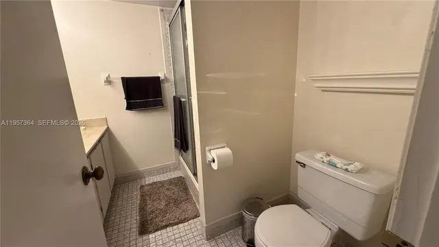 a bathroom with a toilet and a sink