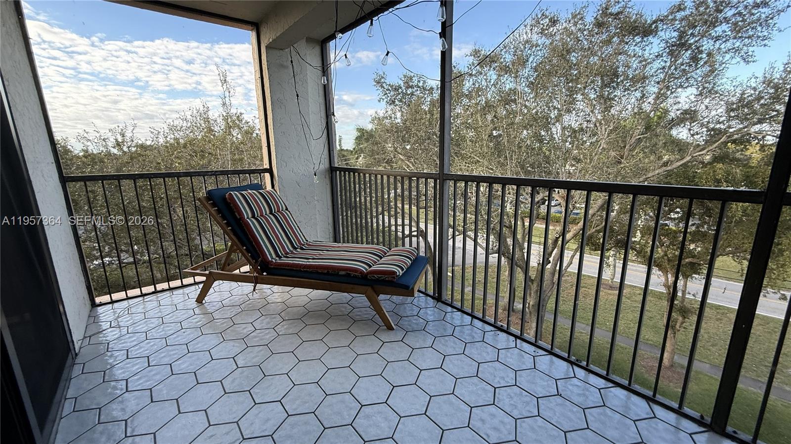 6800 Cypress Road, Unit 501 Plantation, FL 33317 - Photo 24 of 40 a view of a two chairs in the balcony