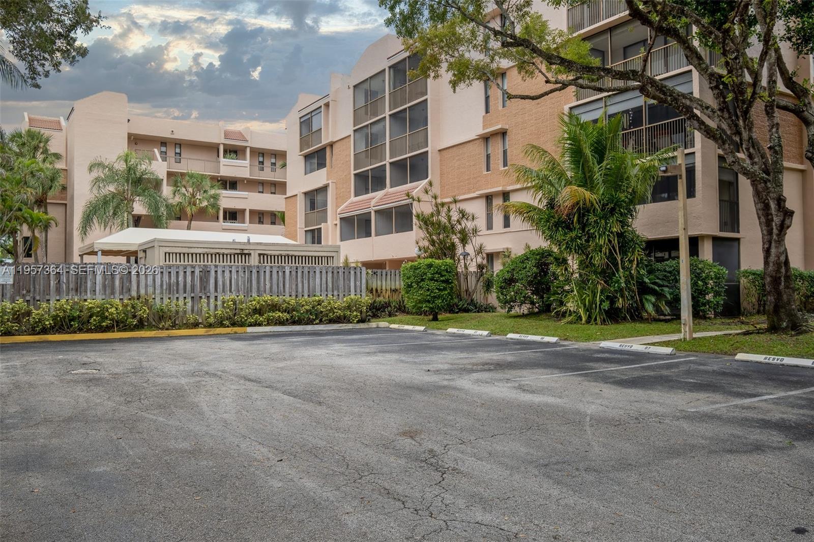 6800 Cypress Road, Unit 501 Plantation, FL 33317 - Photo 33 of 40 a view of a building with a yard