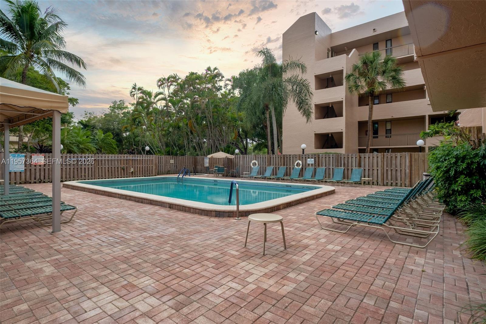 6800 Cypress Road, Unit 501 Plantation, FL 33317 - Photo 35 of 40 a view of swimming pool with a yard